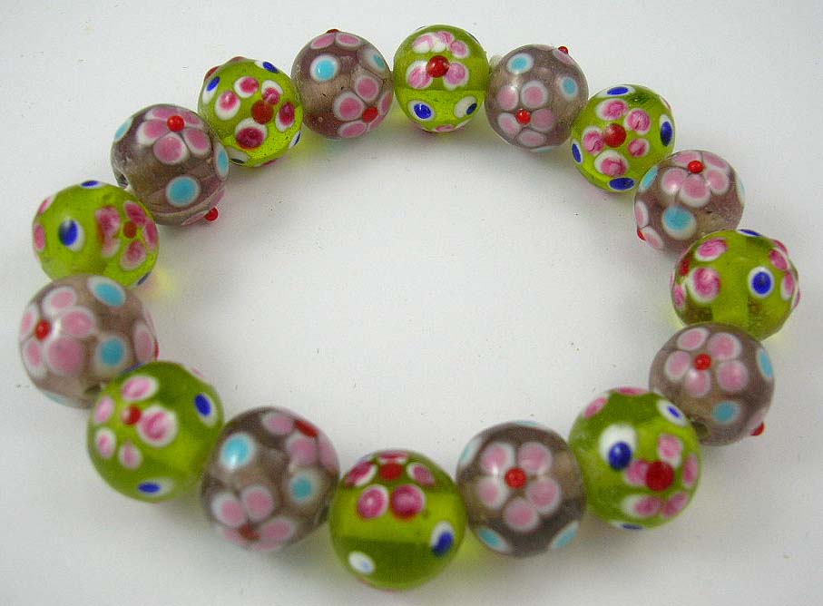 buy jewelry online store delivers green and pink bracelet with flower pattern 